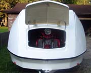 Enclosed motorcycle trailer - fuel efficient, lightweight and aerodynamic fiber reinforced plastic with an aluminum frame