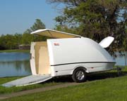 Enclosed motorcycle trailer - fuel efficient, lightweight and aerodynamic fiber reinforced plastic with an aluminum frame